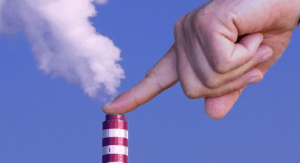 Large finger holding down pollution emitting from smoke stack